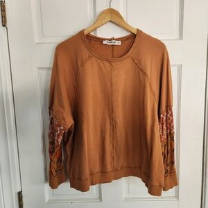 Three Bird Nest Long Sleeve Top